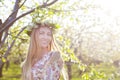 Beautiful romantic woman with long blond hair in a wreath Royalty Free Stock Photo