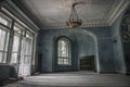 A beautiful room with shabby walls in an old abandoned house. Abandoned haunted manor. Royalty Free Stock Photo