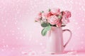 Beautiful rose flowers in pink vase for Womens day or Mothers day greeting card