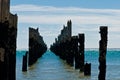 Beautiful rotten mooring on a beach Royalty Free Stock Photo