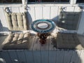 Beautiful round table with soft cushions for a seat in a street cafe in Sochi 09.05.2019 Royalty Free Stock Photo