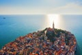 Beautiful Rovinj at sunset. Evening aerial photo of the old town of Rovinj with church of St. Euphemia, Istria, Croatia Royalty Free Stock Photo