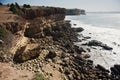 Beautiful rugged coastline with waves crashing against the cliffs