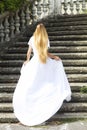 Beautiful running bride outdoors in park Royalty Free Stock Photo