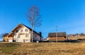 Beautiful rural landscape against the backdrop of the Carpathian Mountains in early spring Royalty Free Stock Photo