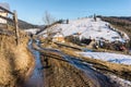 Beautiful rural landscape against the backdrop of the Carpathian Mountains in early spring Royalty Free Stock Photo