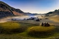 Beautiful rural mountain landscape in the sunrise light with morning fog, Fundatura Ponorului Royalty Free Stock Photo