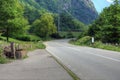 Road Alps mountains alpine landscape summer travel turn empty highway nature green forest rural way country trip route journey car Royalty Free Stock Photo