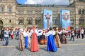 Russian folk dance in national costumes on red square in Moscow