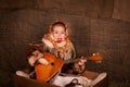 Beautiful russian girl in a shawl sitting in a cart