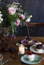 The beautiful rustic bouquet of flowers on festive table Royalty Free Stock Photo