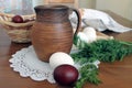 Rustic still life with clay jug and eggs Royalty Free Stock Photo