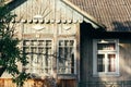 Beautiful rustic wooden old building in sunny garden, exploring