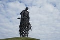 Beautiful sad monument to Russian warrior died in World War II. Weapons in hands and cranes fly away. Russia, Tver