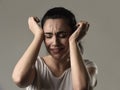 Beautiful and sad woman crying desperate and depressed with tears on her eyes suffering pain Royalty Free Stock Photo