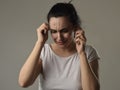 Beautiful and sad woman crying desperate and depressed with tears on her eyes suffering pain Royalty Free Stock Photo