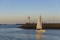 Beautiful sailboat and Howth Lighthouse