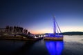 great sunset in the harbor, boats and sailboats tied to the dock, reflections, Volos, Greece