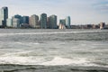 Beautiful sailing ship in Hudson bay, New York. Manhattan`s downtown skyscrapers on background