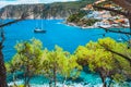 Beautiful sailing yacht near picturesque seacoast. Assos village Mediterranean Sea, Greece. Summer vacation on Greek