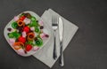 Beautiful salad with edible flowers and strawberry