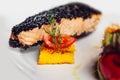 Salmon fillet with sesame close-up on a plate. Royalty Free Stock Photo