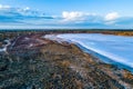 Shallow salt lake at sunrise in Australian outback. Royalty Free Stock Photo