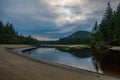 The beautiful San Josef River on a cloudy morning with reflection in Cape Scott Provincial park on Vancouver Island, British