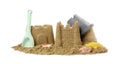 Beautiful sand castles, shells and plastic beach toys on white Royalty Free Stock Photo