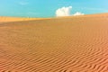 Beautiful sand dunes with blue sky and white clouds Royalty Free Stock Photo