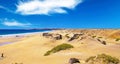 Beautiful sand dunes landscape, empty wild idyllic deserted lonely wide natural beach Playa del Aljibe, blue atlantic ocean Royalty Free Stock Photo