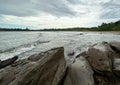 Beautiful sandstone rock beach, wave soft blue breaking empty beach daytime. clean sandy surfing Brunei. Landscape water pattern Royalty Free Stock Photo