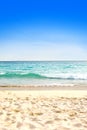 Beautiful sandy beach against blue sky