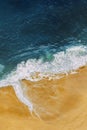 Beautiful sandy beach with blue sea, vertical view. Drone view of tropical blue ocean beach Nusa penida Bali Indonesia. Royalty Free Stock Photo