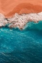 Beautiful sandy beach with blue sea, vertical view. Drone view of tropical blue ocean beach Nusa penida Bali Indonesia. Royalty Free Stock Photo