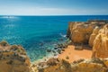 Beautiful sandy beach among cliffs near Albufeira, Algarve region, Portugal Royalty Free Stock Photo