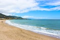 Beautiful sandy beach on the coast of Tyrrhenian sea in Italian Cefalu taken during off season. The small city in Sicily Royalty Free Stock Photo