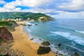 Beautiful sandy beach with good waves for surfing in Bakio, Basque country, Spain Royalty Free Stock Photo
