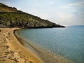 Beautiful sandy beach and overcast sky. Marmari in Laconia, Greece