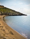 Beautiful sandy beach and overcast sky. Marmari in Laconia, Greece