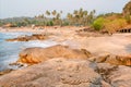 Beautiful sandy beach with palm trees. Calmness of South India, Goa area Royalty Free Stock Photo