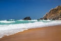 Beautiful sandy beach in Praia da Adraga, Portugal.