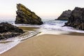 Beautiful sandy beach with rocks on Atlantic coast, Portugal Royalty Free Stock Photo