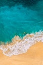 Beautiful sandy beach with turquoise sea, vertical view. Drone view of tropical turquoise ocean beach Nusa penida Bali Indonesia. Royalty Free Stock Photo