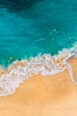 Beautiful sandy beach with turquoise sea, vertical view. Drone view of tropical turquoise ocean beach Nusa penida Bali Indonesia. Royalty Free Stock Photo