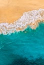 Beautiful sandy beach with turquoise sea, vertical view. Drone view of tropical turquoise ocean beach Nusa penida Bali Indonesia. Royalty Free Stock Photo