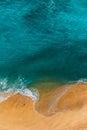 Beautiful sandy beach with turquoise water, vertical photo. Wild beach with beautiful clear sea. Yellow sand with turquoise sea. Royalty Free Stock Photo