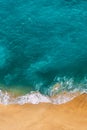 Beautiful sandy beach with turquoise water, vertical photo. Wild beach with beautiful clear sea. Yellow sand with turquoise sea. Royalty Free Stock Photo