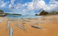 Beautiful sandy Playa Del Portio Biskaya, Cantabria, Spain summer landscape. Atlantic Ocean coastline view with rock formations Royalty Free Stock Photo