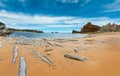 Beautiful sandy Playa Del Portio Biskaya, Cantabria, Spain summer landscape. Atlantic Ocean coastline view with rock formations Royalty Free Stock Photo